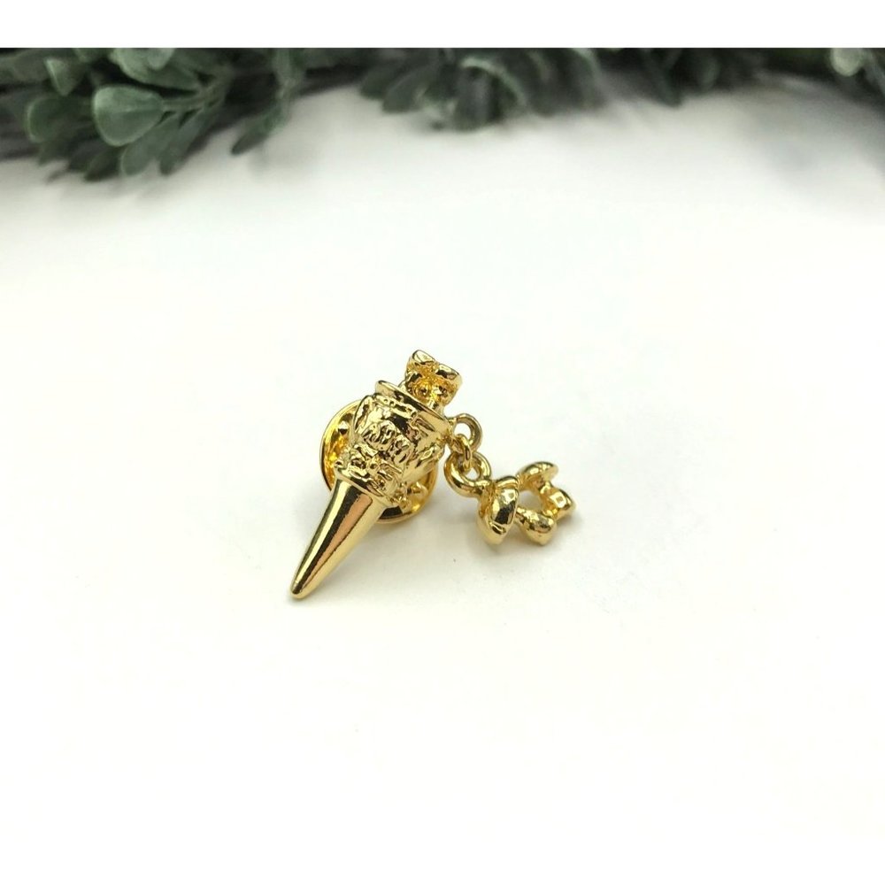Tack pin brooch gold tone with a mushroom charm by Kirks Folly